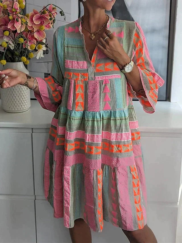 Yasmine - Striking Midi Dress with Deep V-neck and Colorful Pattern
