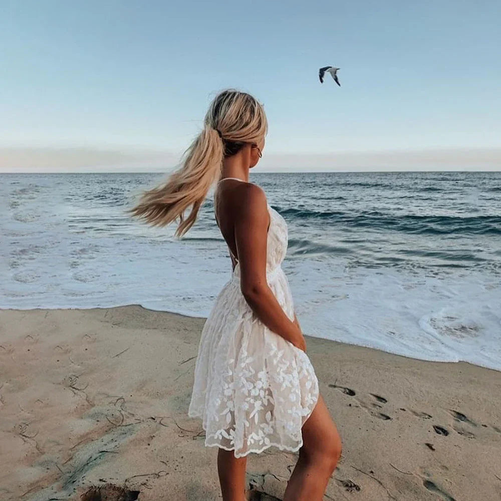 Kelly - Elegant White Lace Mini Dress with Deep V-neck and Adjustable Straps