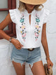 Delilah - Vintage Blouse with Embroidered Ruffle Sleeves and Floral Detail