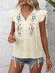 Delilah - Vintage Blouse with Embroidered Ruffle Sleeves and Floral Detail