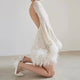 Sophie - Glamorous Evening Dress with Sequins and Feather Hem