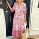 Nola - Bohemian V-neck Dress with Vibrant Floral Print