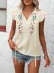Delilah - Vintage Blouse with Embroidered Ruffle Sleeves and Floral Detail